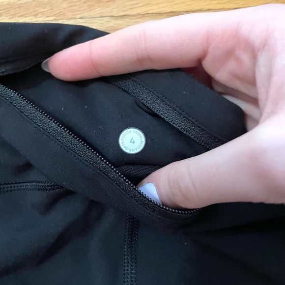 Lululemon Black Leggings 28” Length Size 4 With Pockets and Reflective Parts - Picture 5 of 9